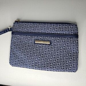 Tommy Hilfiger Wristlet Blue And White with red accents.